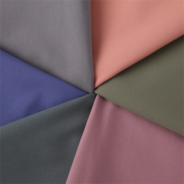 85% پلی استر 15% اسپندکس پارچه لباس شنای بافتنی نرم و صاف برای لباس شنای پوشاک 