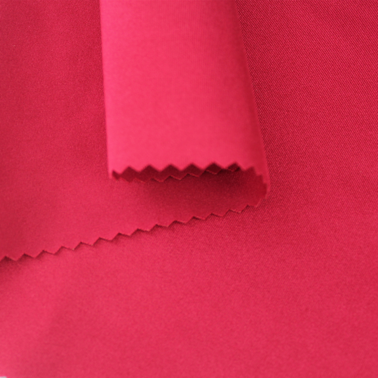 استفاده گسترده از پارچه لباس شنا براق بافتنی 85% پلی استر 15% اسپندکس تار برای لباس یوگا بیکینی